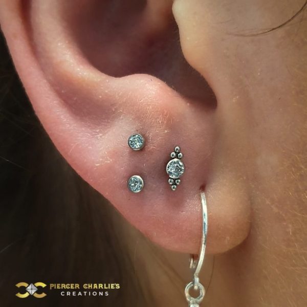 Stacked Lobe and next to a Double Tribead Stud