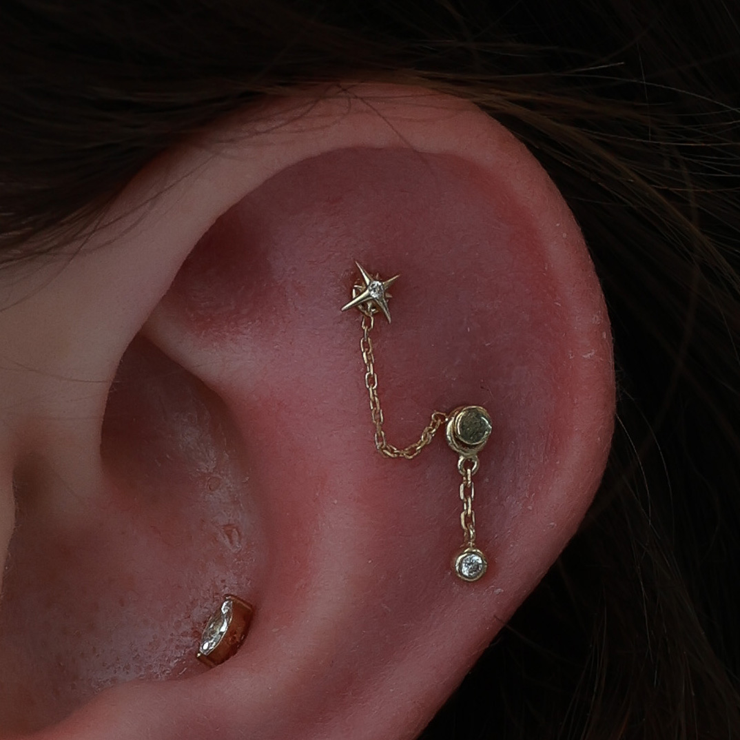 Flat Piercings with Connecting Chains